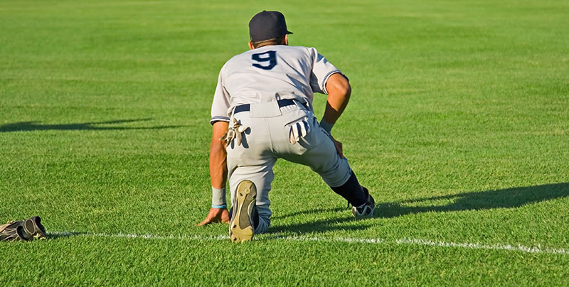 Baseball player stretching